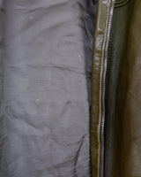 This Valentino jacket brings the class and the finest green leather, all wrapped up in one slick package! The only catch? No working zip (check out the last two photos to get the full scoop)! But don't let a defected zipper keep you from rocking the look!