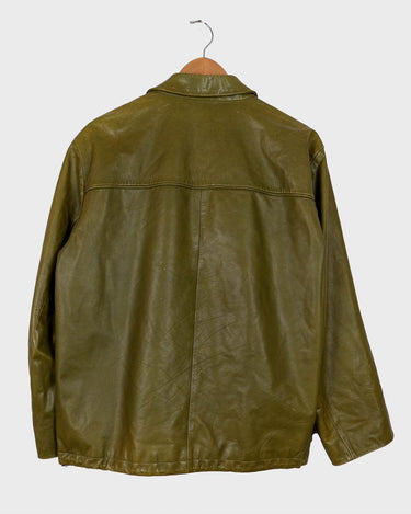 This Valentino jacket brings the class and the finest green leather, all wrapped up in one slick package! The only catch? No working zip (check out the last two photos to get the full scoop)! But don't let a defected zipper keep you from rocking the look!