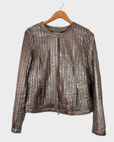 This Milestone nappa leather jacket will have you shimmering with glam and elegance! Crafted from ultra thin and luxurious nappa leather. Ideal for spring and summertime sparkle!