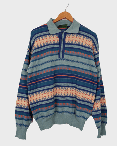 This cute Vintage 90s blue geometric pattern sweater (thin!) will have you feeling snazzy! You won't be able to deny the 80s / 90s's charm with its unique pink detailing - perfect for adding an extra splash of personality!