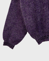 This vintage 80s sweater is sure to add a splash of purple passion to any wardrobe! Crafted from a blend of alpaca, lana wool and acryl mix this sweater is perfect to survive the cold winter days. 
