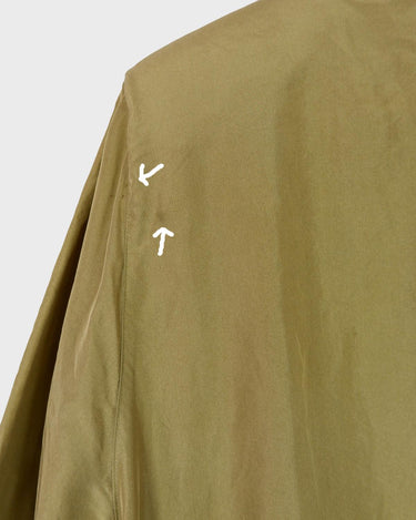 Who says shoulder pads are a thing of the past? Take a walk on the wild side and grab this vintage 80s golden (light greenish undertone) silk blouse with confidence!
