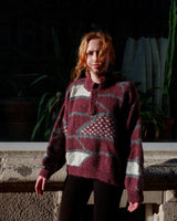 Add a pop of pink to your wardrobe with our vintage 80s thick wool sweater, featuring a geometric pattern.