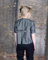 Get ready to shine in this Premium SPORTMAX short sleeve blouse! Made from a grey linen mix melánge fabric with a shimmering finish, this blouse is the perfect addition to your wardrobe for any special occasion! Shimmy shimmy on!