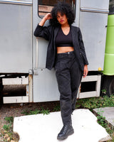 If you’re looking for a timeless piece, you can’t go wrong with this Vintage 90s linen x cotton black blazer. Crafted in Morocco, you’ll be making a statement of effortless elegance in no time!