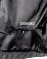 Introducing this Vintage 80s black fireman clasp leather coat, a must-have piece for your collection. Made of buttery soft leather, this coat exudes a cool and edgy vibe.