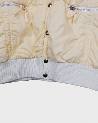 Rare 80s collab between French art rebel Castelbajac and Italian luxury label ICEBERG. A bold mix of soft knit sleeves and lightweight woven fabric, detailed with silver snaps and zip pockets. Playful, offbeat, and seriously collectible.