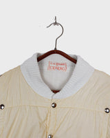 Rare 80s collab between French art rebel Castelbajac and Italian luxury label ICEBERG. A bold mix of soft knit sleeves and lightweight woven fabric, detailed with silver snaps and zip pockets. Playful, offbeat, and seriously collectible.