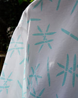 Sun’s out, button up! This Italian vintage white polo shirt brings serious 80s energy with its sharp button-up neckline and eye-catching turquoise pattern. A rare vintage gem that’s equal parts sporty, stylish, and a little cheeky. Wear it loud, wear it proud – this polo’s got main character energy.