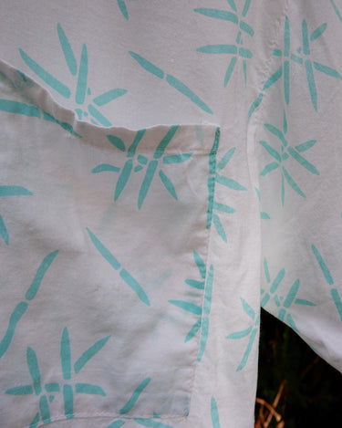 Sun’s out, button up! This Italian vintage white polo shirt brings serious 80s energy with its sharp button-up neckline and eye-catching turquoise pattern. A rare vintage gem that’s equal parts sporty, stylish, and a little cheeky. Wear it loud, wear it proud – this polo’s got main character energy.