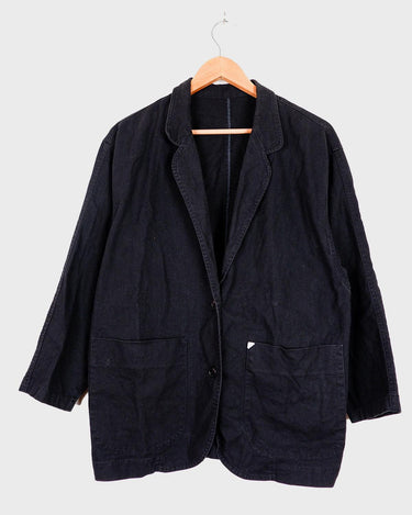 If you’re looking for a timeless piece, you can’t go wrong with this Vintage 90s linen x cotton black blazer. Crafted in Morocco, you’ll be making a statement of effortless elegance in no time!