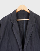 If you’re looking for a timeless piece, you can’t go wrong with this Vintage 90s linen x cotton black blazer. Crafted in Morocco, you’ll be making a statement of effortless elegance in no time!