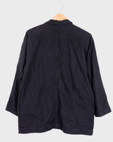If you’re looking for a timeless piece, you can’t go wrong with this Vintage 90s linen x cotton black blazer. Crafted in Morocco, you’ll be making a statement of effortless elegance in no time!