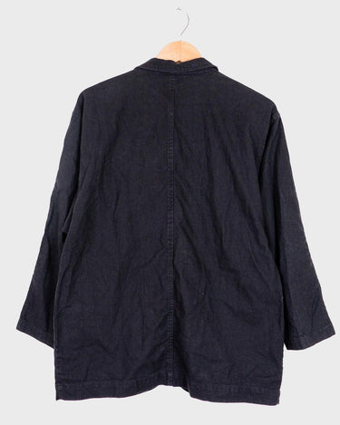 If you’re looking for a timeless piece, you can’t go wrong with this Vintage 90s linen x cotton black blazer. Crafted in Morocco, you’ll be making a statement of effortless elegance in no time!