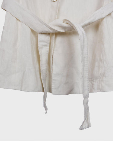 Slip into effortless luxury with this vintage Max Mara pure linen blouse — straight from the golden age of 90s Italian fashion. With its sharp lapels, sculpted silhouette, and waist-defining belt, it’s pure understated power dressing. Made from 100% premium linen, it’s light, luxe, and built for those sun-drenched days. Vintage Max Mara never goes out of style.