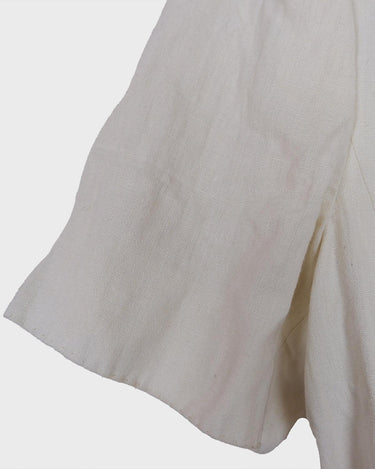 Slip into effortless luxury with this vintage Max Mara pure linen blouse — straight from the golden age of 90s Italian fashion. With its sharp lapels, sculpted silhouette, and waist-defining belt, it’s pure understated power dressing. Made from 100% premium linen, it’s light, luxe, and built for those sun-drenched days. Vintage Max Mara never goes out of style.