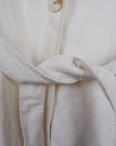Slip into effortless luxury with this vintage Max Mara pure linen blouse — straight from the golden age of 90s Italian fashion. With its sharp lapels, sculpted silhouette, and waist-defining belt, it’s pure understated power dressing. Made from 100% premium linen, it’s light, luxe, and built for those sun-drenched days. Vintage Max Mara never goes out of style.