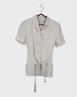 Slip into effortless luxury with this vintage Max Mara pure linen blouse — straight from the golden age of 90s Italian fashion. With its sharp lapels, sculpted silhouette, and waist-defining belt, it’s pure understated power dressing. Made from 100% premium linen, it’s light, luxe, and built for those sun-drenched days. Vintage Max Mara never goes out of style.
