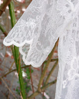 Ditch the boring basics—this handmade lace top is crafted from upcycled curtains. With its romantic vibes, sheer elegance, and intricate embroidery, it’s perfect for layering and embracing your boho side. This one-of-a-kind piece is sustainably made and packed with attitude. Who knew curtains could slay this hard?
