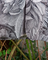 Make a statement with this vintage Escada blazer—bold, tailored, and anything but ordinary. Its detailed monochrome botanical print and iconic Escada cut turn timeless elegance into something effortlessly cool. A rare secondhand gem for lovers of slow fashion and sharp silhouettes, this piece brings instant edge to any outfit. Vintage luxury, with attitude.
