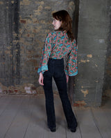 Inspired by the free-spirited vibe of the 70s, this boho paisley-patterned silk-blend tie crop-fit blouse features flared sleeves and a breezy silhouette. Lightweight, very thin, colorful and perfect for sizes XS to S. Throw it on, tie it up, and let your outfit do the talking.