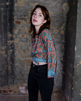 Inspired by the free-spirited vibe of the 70s, this boho paisley-patterned silk-blend tie crop-fit blouse features flared sleeves and a breezy silhouette. Lightweight, very thin, colorful and perfect for sizes XS to S. Throw it on, tie it up, and let your outfit do the talking.
