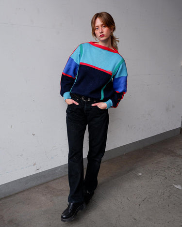 Feel the vibes of this Premium Rossignol Vintage 80s sweater! Featuring a u-form collar and a sweet blue-red color combo that's a perfect balance, it's sure to be the perfect go-to sweater. Get it before it's gone!