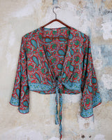Inspired by the free-spirited vibe of the 70s, this boho paisley-patterned silk-blend tie crop-fit blouse features flared sleeves and a breezy silhouette. Lightweight, very thin, colorful and perfect for sizes XS to S. Throw it on, tie it up, and let your outfit do the talking.