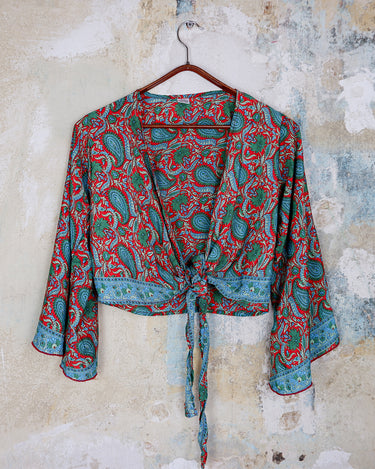 Inspired by the free-spirited vibe of the 70s, this boho paisley-patterned silk-blend tie crop-fit blouse features flared sleeves and a breezy silhouette. Lightweight, very thin, colorful and perfect for sizes XS to S. Throw it on, tie it up, and let your outfit do the talking.