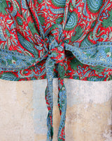 Inspired by the free-spirited vibe of the 70s, this boho paisley-patterned silk-blend tie crop-fit blouse features flared sleeves and a breezy silhouette. Lightweight, very thin, colorful and perfect for sizes XS to S. Throw it on, tie it up, and let your outfit do the talking.