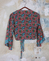 Inspired by the free-spirited vibe of the 70s, this boho paisley-patterned silk-blend tie crop-fit blouse features flared sleeves and a breezy silhouette. Lightweight, very thin, colorful and perfect for sizes XS to S. Throw it on, tie it up, and let your outfit do the talking.