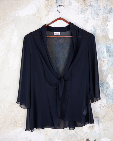 See-through but never low-key – this sheer lace-up jacket brings attitude with every detail. The transparent fabric meets lacing for a look that’s anything but basic. A y2k piece that speaks for itself.
