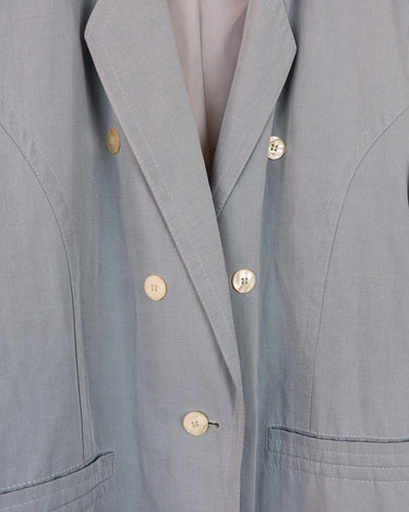 This is your ultimate power move: a Vintage 80s light blue linen mix blazer (thin) that's sure to make a splash!