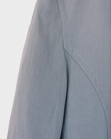 This is your ultimate power move: a Vintage 80s light blue linen mix blazer (thin) that's sure to make a splash!