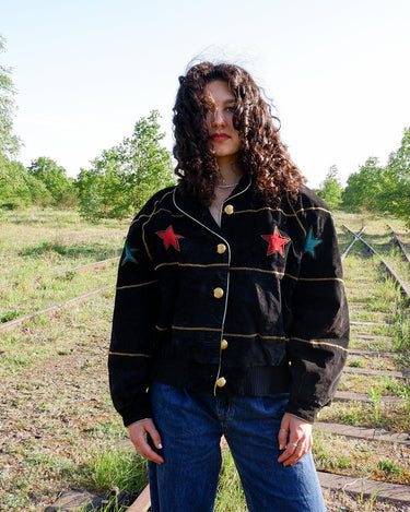 Introducing the ultimate premium jacket for all the 80s lovers out there - the 80s Vintage Dino'z bomber leather jacket with colorful stars! 