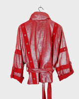 Add a touch of sparkle to your wardrobe with this premium vintage 80s red glitter lamb skin jacket (thin). The belted design offers a flattering fit, while the soft and supple leather provides luxurious comfort!