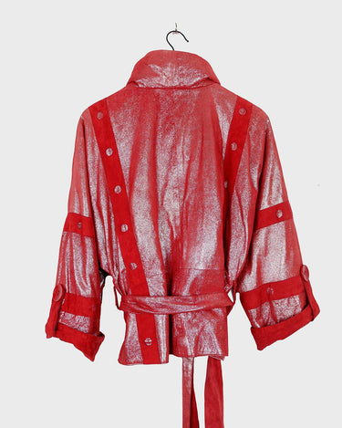 Add a touch of sparkle to your wardrobe with this premium vintage 80s red glitter lamb skin jacket (thin). The belted design offers a flattering fit, while the soft and supple leather provides luxurious comfort!