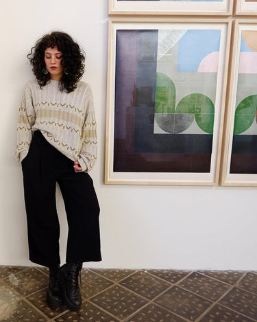 Tired of the same-old, boring sweaters? Look no further than this vintage 80s sweater! It's the perfect mix of classic and oldscool with its dirty white beige hue and classic cable knit pattern. Brown geometric details give it a subtle but unique edge. The thin knit makes it perfect for all-year wear!