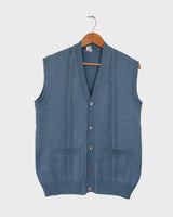 This vintage vest is the perfect mix of classic and casual - sure to be your new go-to look! Its 80s style knitted fabric in a bold blue hue is sure to make it easy to match it with your wardrobe.