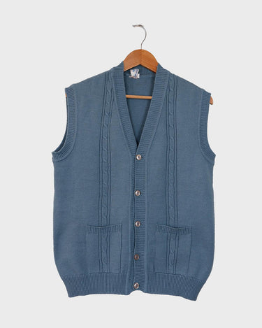 This vintage vest is the perfect mix of classic and casual - sure to be your new go-to look! Its 80s style knitted fabric in a bold blue hue is sure to make it easy to match it with your wardrobe.