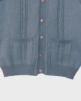 This vintage vest is the perfect mix of classic and casual - sure to be your new go-to look! Its 80s style knitted fabric in a bold blue hue is sure to make it easy to match it with your wardrobe.