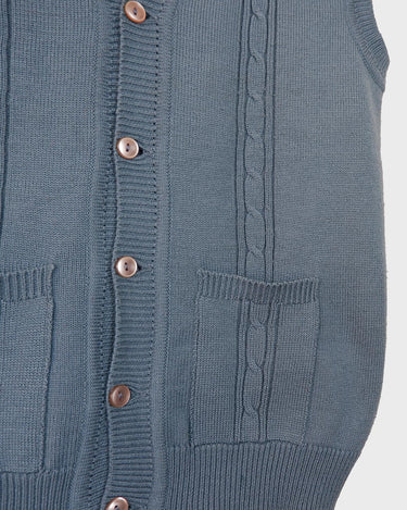 This vintage vest is the perfect mix of classic and casual - sure to be your new go-to look! Its 80s style knitted fabric in a bold blue hue is sure to make it easy to match it with your wardrobe.