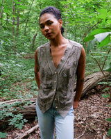 Fine beadwork and soft sequins give this 90s brown-grey waistcoat its understated shine – subtle, but impossible to miss. With a paisley satin back and belt, it’s a thoughtful piece for those who appreciate timeless style and fine detail.