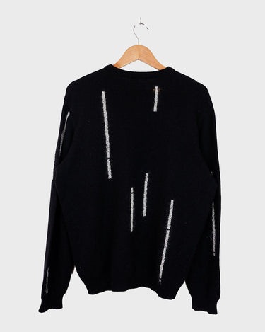 This 1980s Gianni Versace sweater (thin) is vintage luxury in every sense! This luxury sweater features furry white stripes for a unique touch! Please keep in mind, that this sweater has a repaired hole at the left front side of this sweater (last photos).
