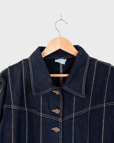 Unleash your inner '90s fashion icon with our Vintage 90s black/dark blue long denim coat! This coat isn't just a coat - it's a statement piece for denim lovers! Embrace this edgy look and grab it now!