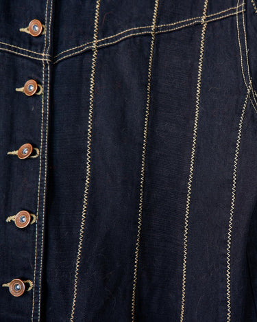 Unleash your inner '90s fashion icon with our Vintage 90s black/dark blue long denim coat! This coat isn't just a coat - it's a statement piece for denim lovers! Embrace this edgy look and grab it now!