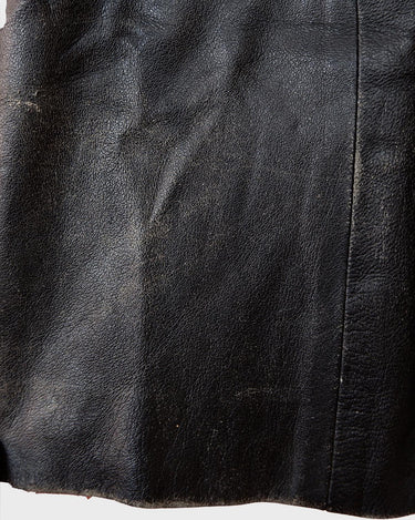 Let your 70s style heart shine with this Vintage 70s black leather penny lane coat with real fur. It features a thin leather that keeps you warm and comfy while you rock that sweet '70s vibe.