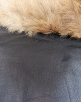Let your 70s style heart shine with this Vintage 70s black leather penny lane coat with real fur. It features a thin leather that keeps you warm and comfy while you rock that sweet '70s vibe.