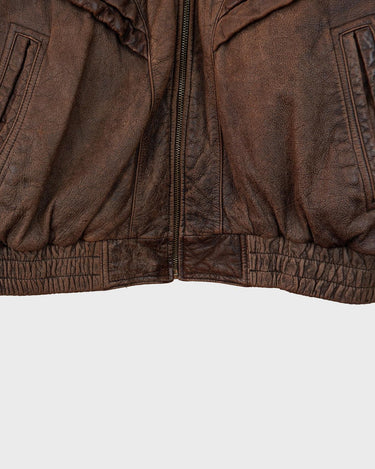 Revive the '80s look with this vintage brown used look leather jacket! It's been around the block, but there's still plenty of life in it enough to make a statement that'll stand the test of time. Please keep in mind, that the inner lining of the leather jacket is full of discoloration and cracks that have been sewn up (condition 4/10 for the inner lining). Please have a look at the last 3 photos for the inner lining.
