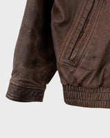 Revive the '80s look with this vintage brown used look leather jacket! It's been around the block, but there's still plenty of life in it enough to make a statement that'll stand the test of time. Please keep in mind, that the inner lining of the leather jacket is full of discoloration and cracks that have been sewn up (condition 4/10 for the inner lining). Please have a look at the last 3 photos for the inner lining.